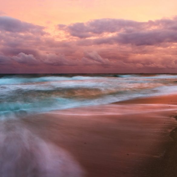 A long exposure photo taken at sunset on the beach in South Florida