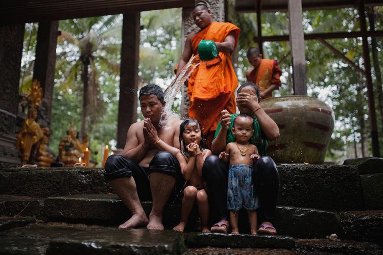 Family blessing by Buddhist monk