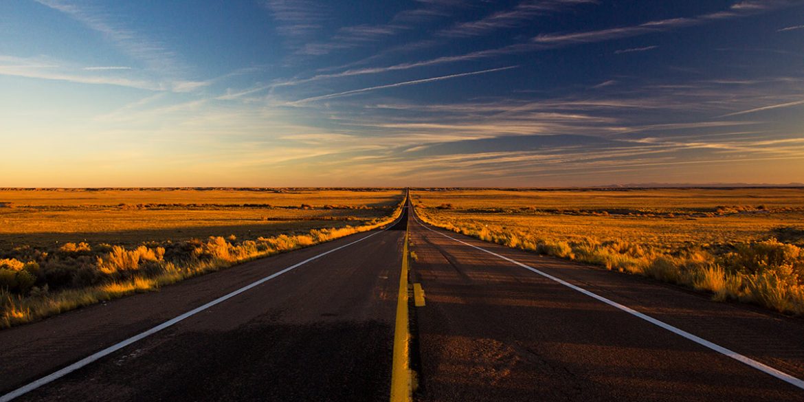 An empty desert road in Arizona