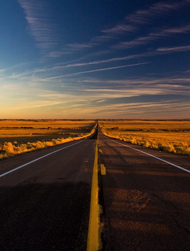 An empty desert road in Arizona