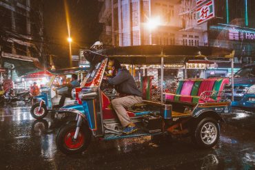 A tuk tuk waiting in the rain in Bangkok, Thailand's Chinatown