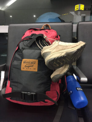 Backpack with a Sawyer filter bottle attached, ready for travel and outdoor adventures